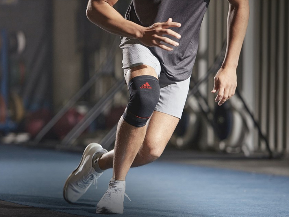 Băng đầu gối Adidas size M ADSU-13322RD