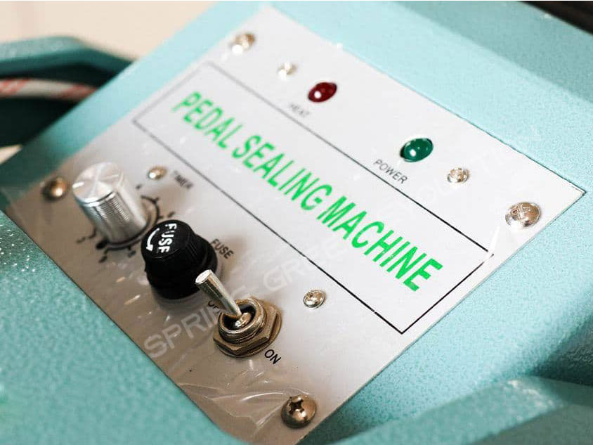 Máy hàn miệng túi dập chân FS02-65 (độ dài dải hàn miệng túi 65cm)