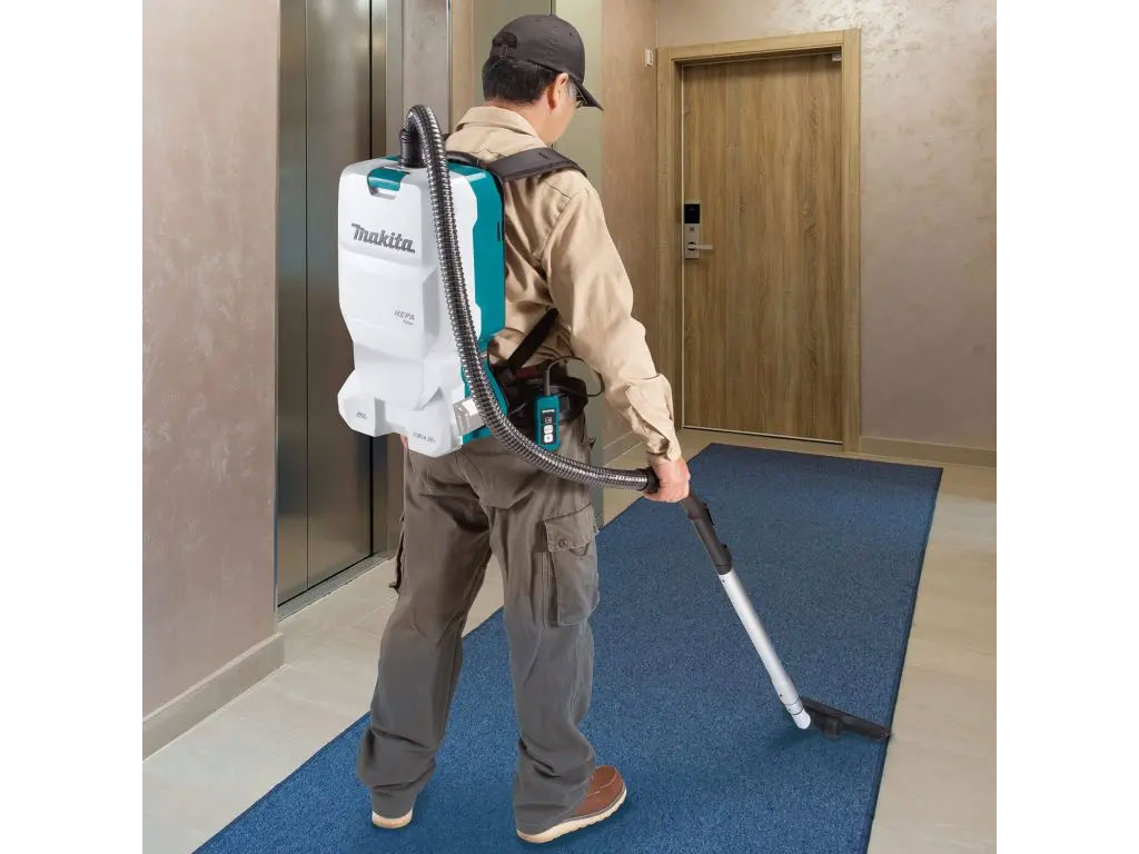 Máy hút bụi đeo vai dùng pin 18V x 2 Makita DVC660Z (chưa pin ,sạc )